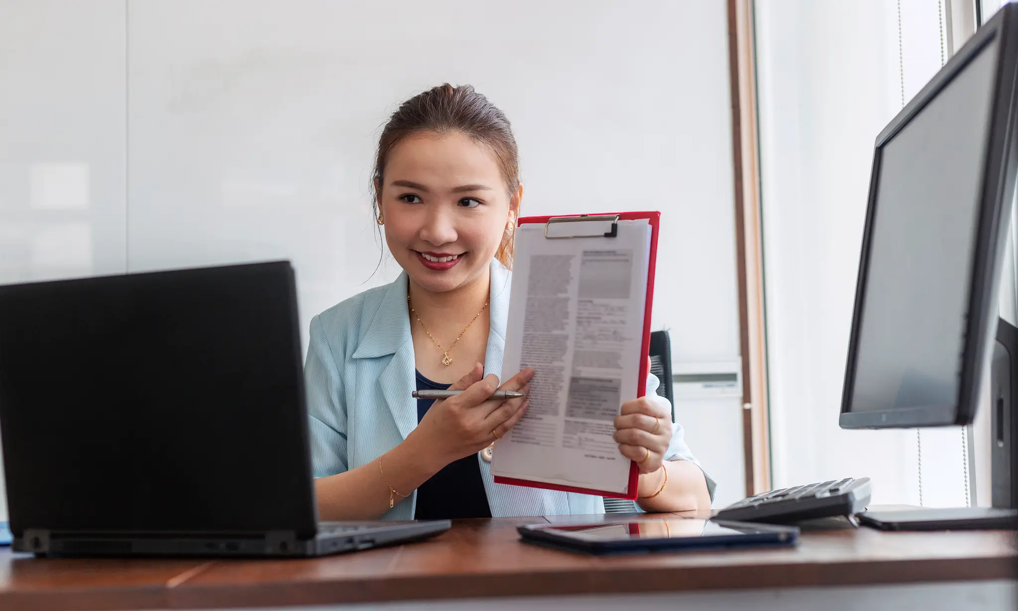 Professional woman conducting virtual meeting presentation