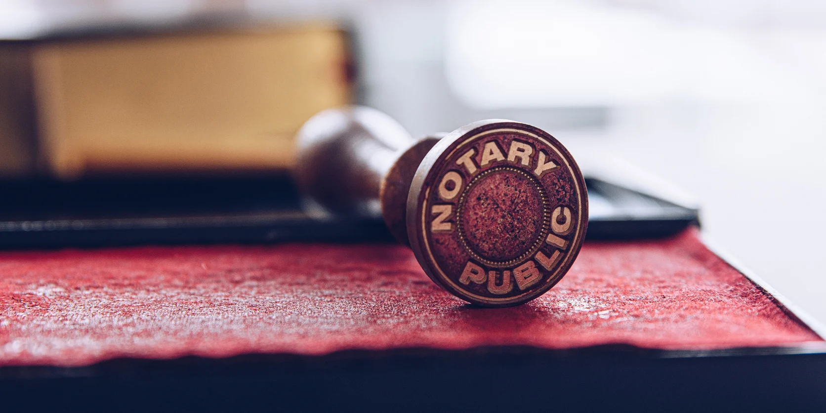 Notary stamp on red ink pad
